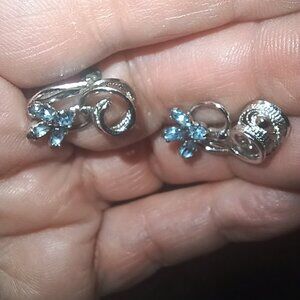 Vintage Blue Rhinestone screwback earrings. marked "sterling"
